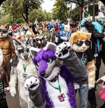 A whole crowd of people in fursuits