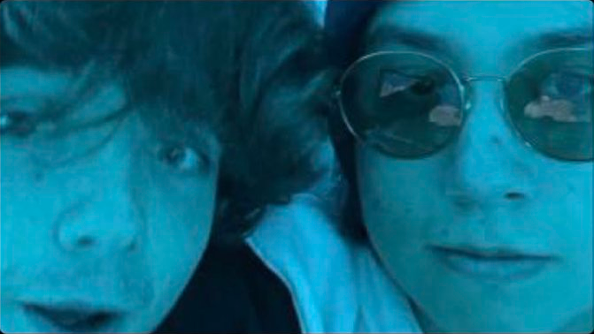 A blue-tinted selfie of Karl and Quackity. I think that’s Quackity anyway. He’s wearing the signature beanie